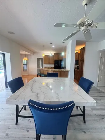 a view of a dining room with furniture