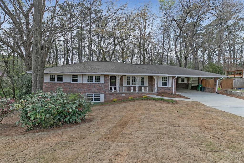 1424 Diamond Head Circle Decatur, GA 30033 - Photo 1 of 1 front view of a house with a garden