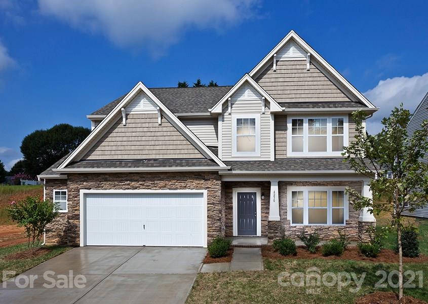 2210 Bluebell Way Tega Cay, SC 29708 - Photo 1 of 1 a front view of a house with a yard