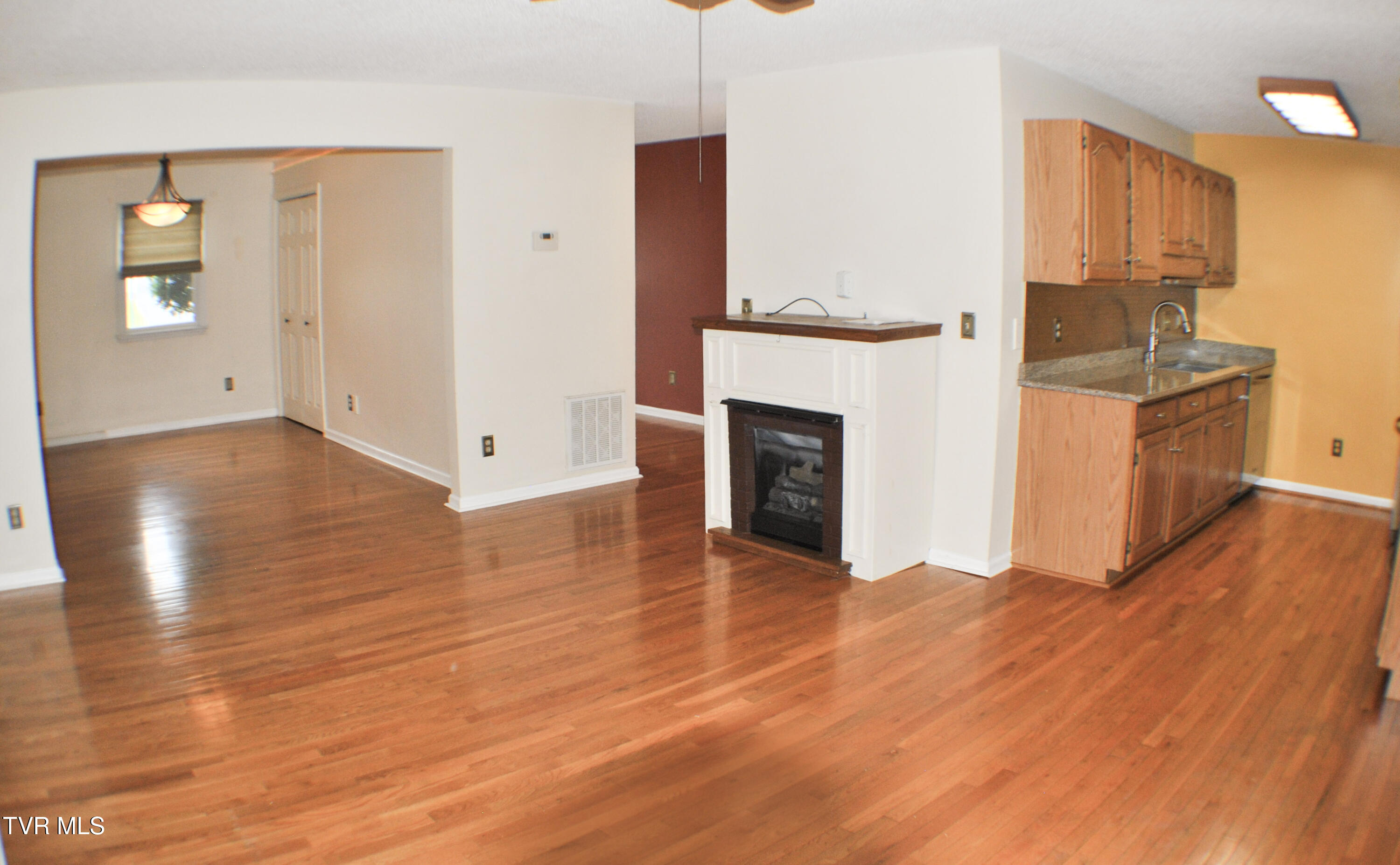 2700 Indian Ridge Road, Unit 23 Johnson City, TN 37604 - Photo 10 of 31 Fireplace/Flex/Kitchen
