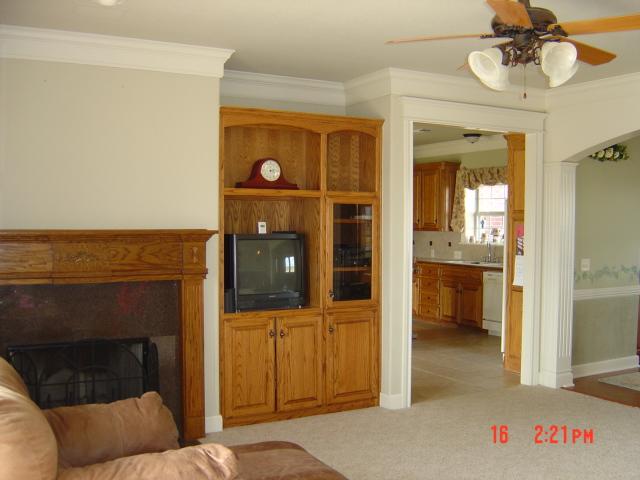 8701 Blackhawk Road Amarillo, TX 79119 - Photo 3 of 20 a living room with furniture and a fireplace