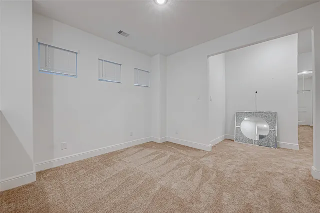 a view of a house with backyard and porch