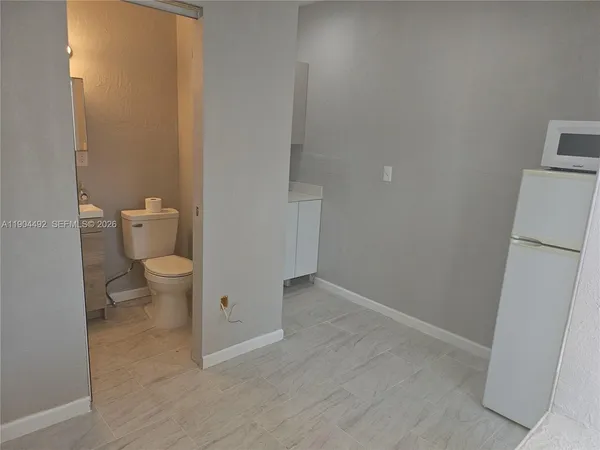 a view of bathroom with a toilet