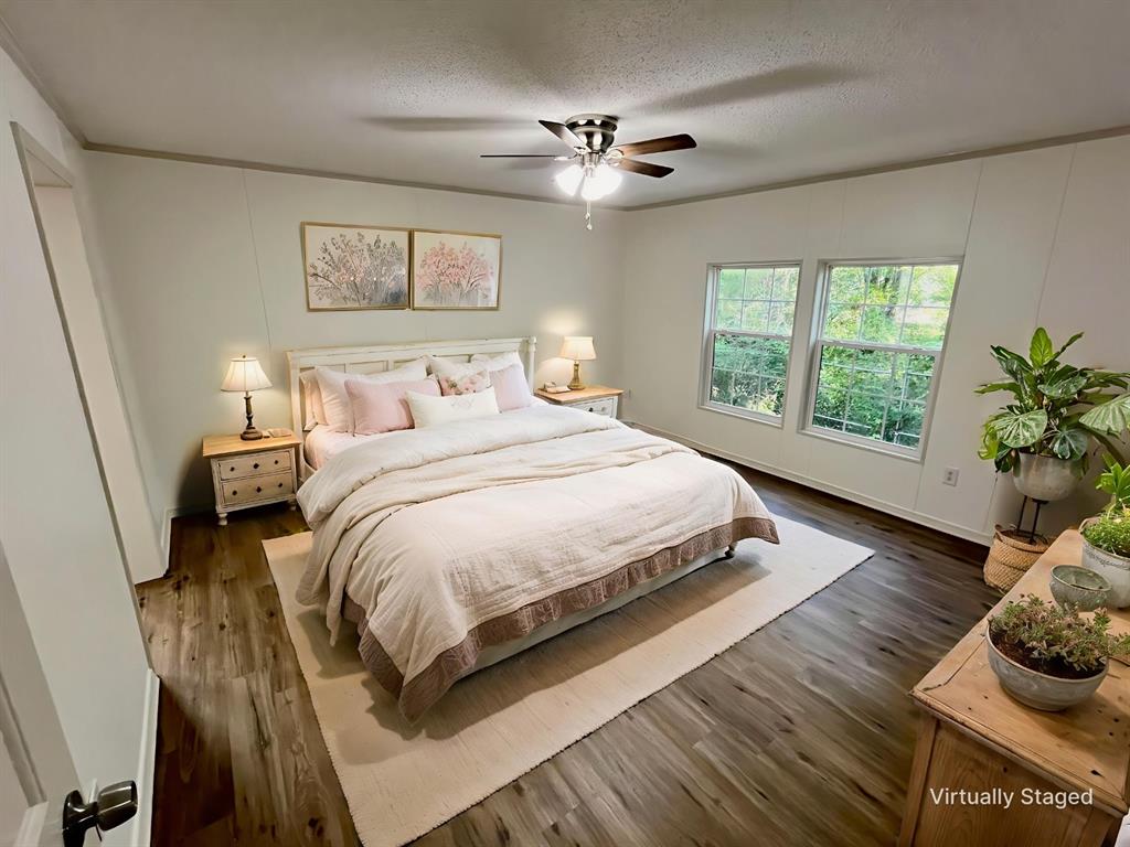 6913 Rice Road Shreveport, LA 71129 - Photo 6 of 26 a bedroom with a bed and window