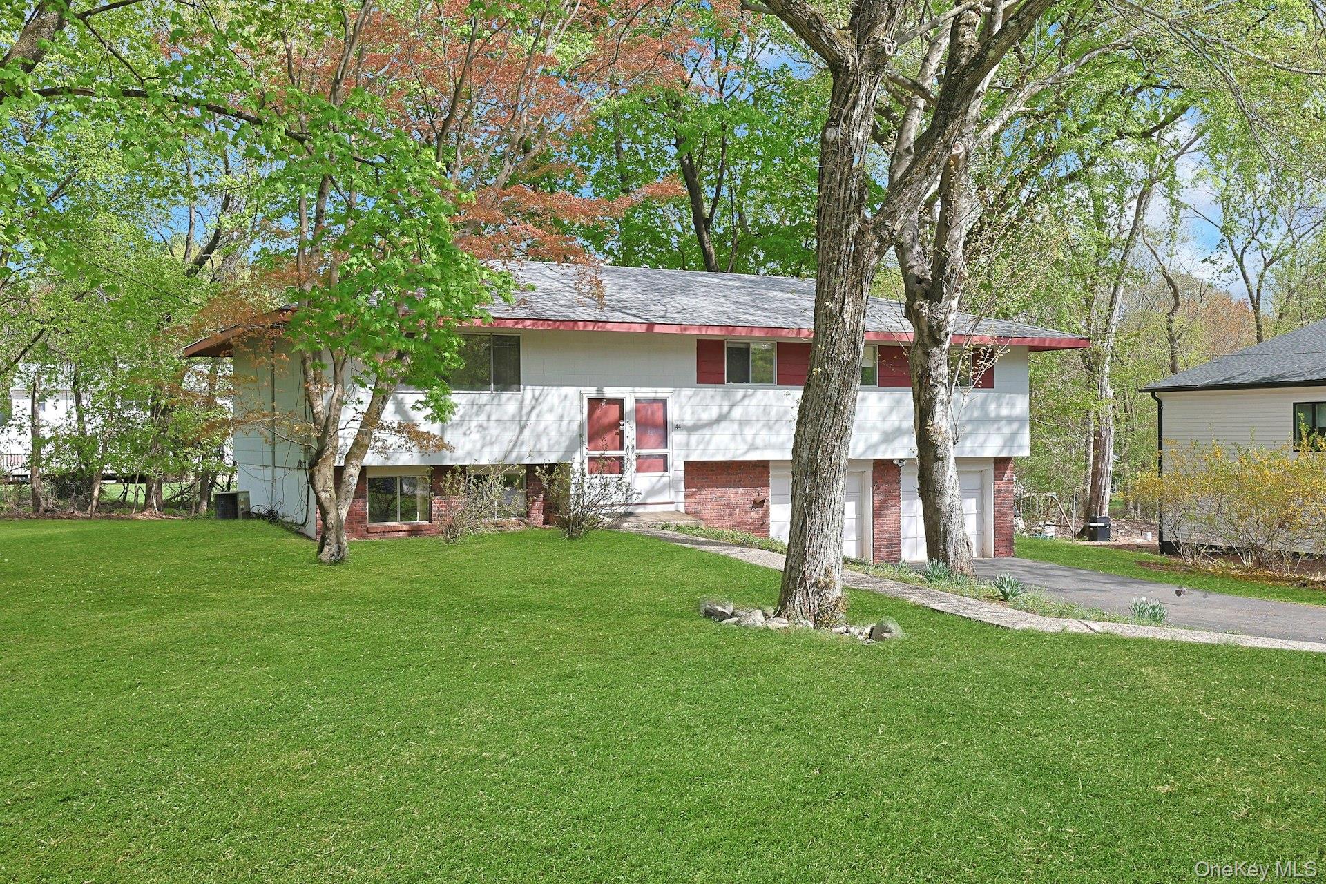 44 Southgate Drive Spring Valley, NY 10977 - Photo 1 of 24 a view of a house with a yard