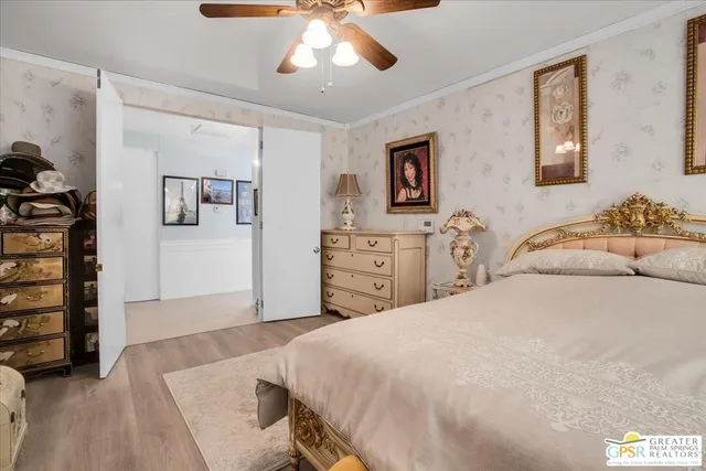 a bedroom with a bed and a cabinets