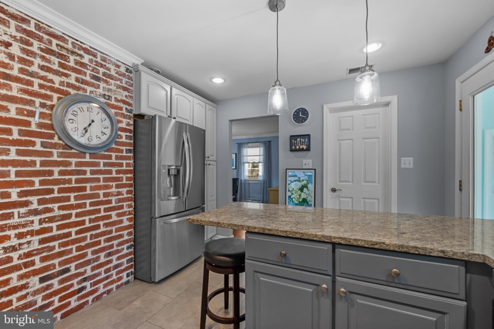1001 Robin Road Silver Spring, MD 20901 - Photo 11 of 46 Charming kitchen with rustic accents.