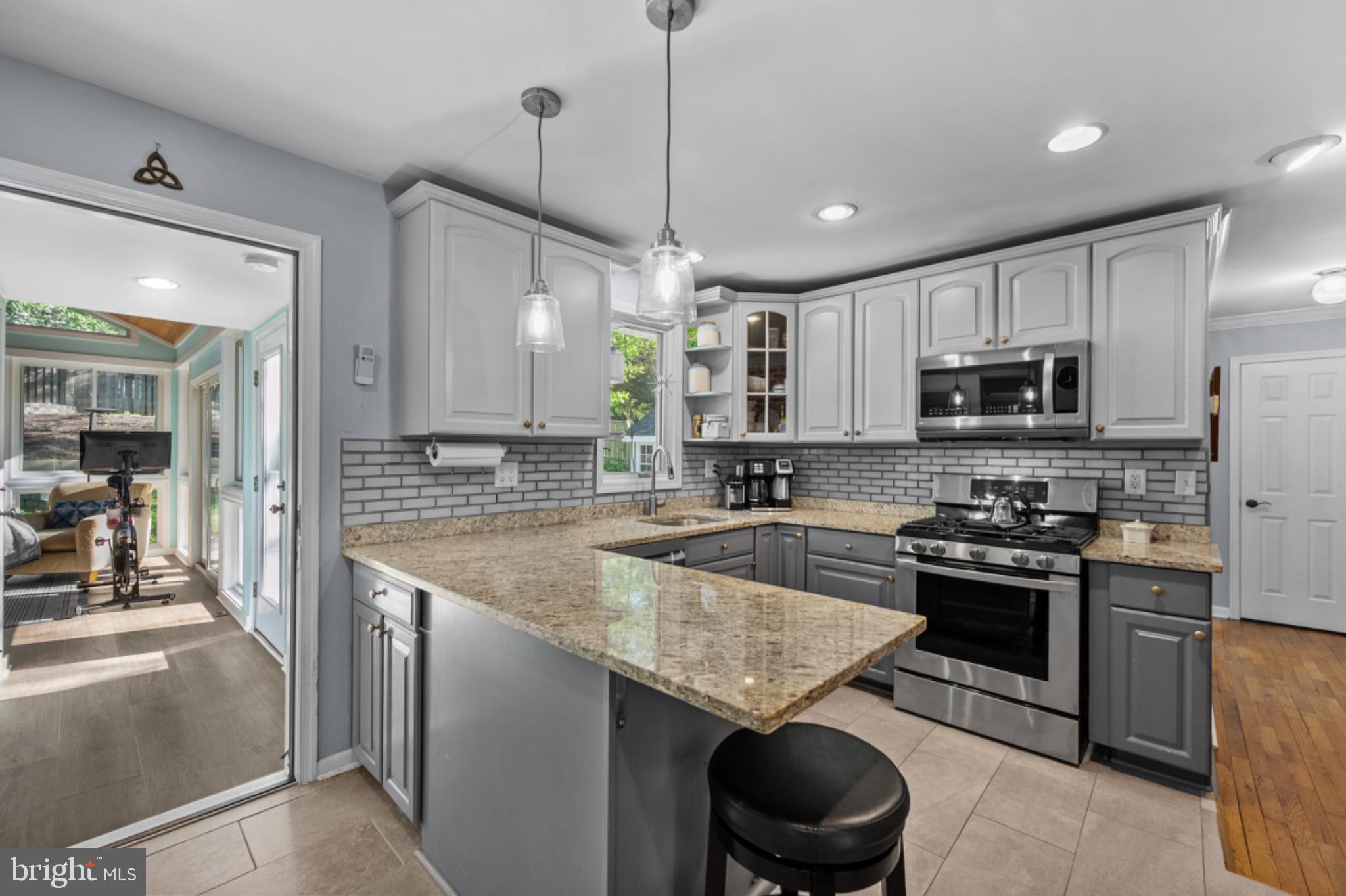 1001 Robin Road Silver Spring, MD 20901 - Photo 12 of 46 Modern kitchen with elegant finishes.