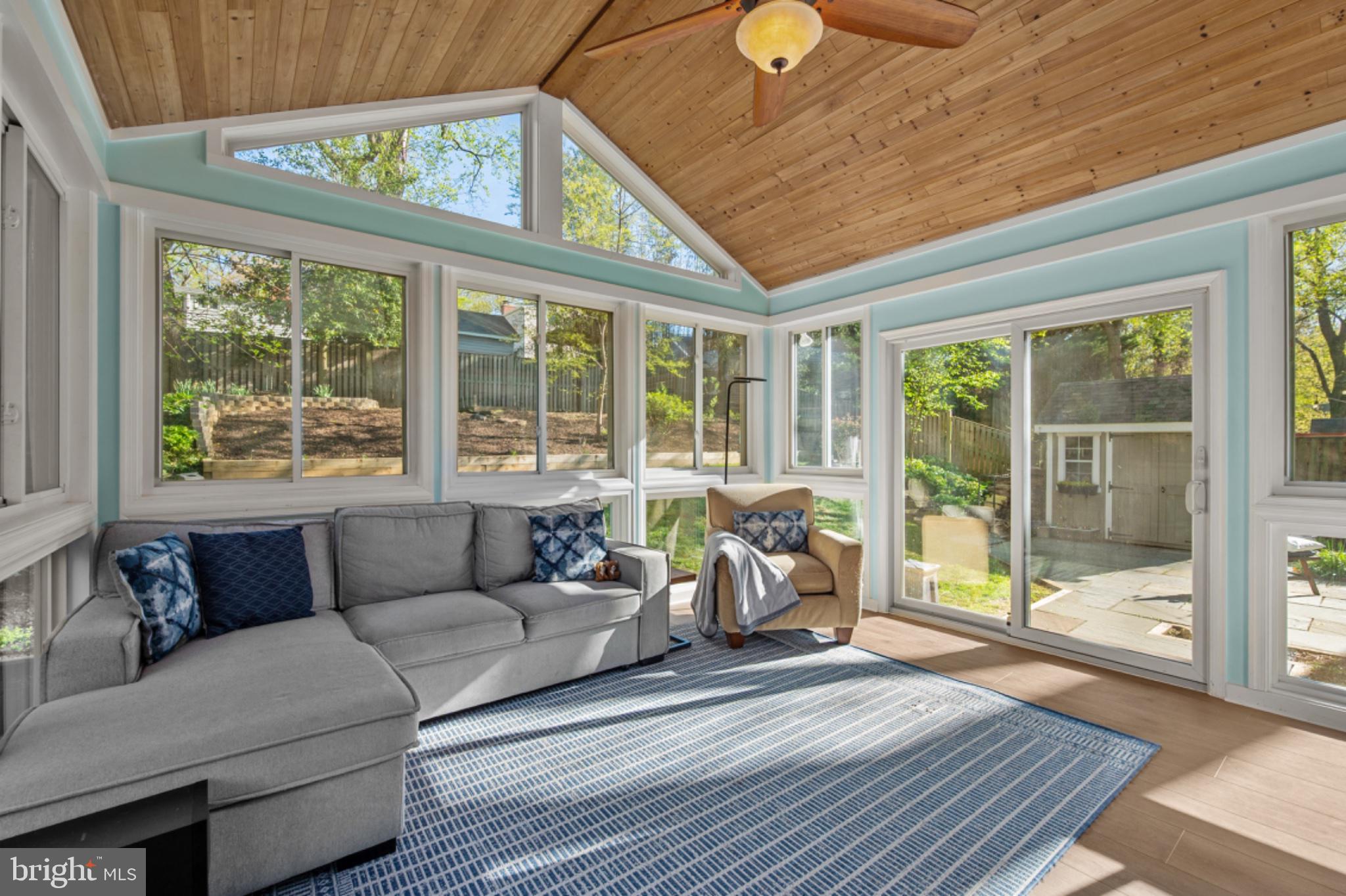 1001 Robin Road Silver Spring, MD 20901 - Photo 13 of 46 Bright sunroom with serene views.