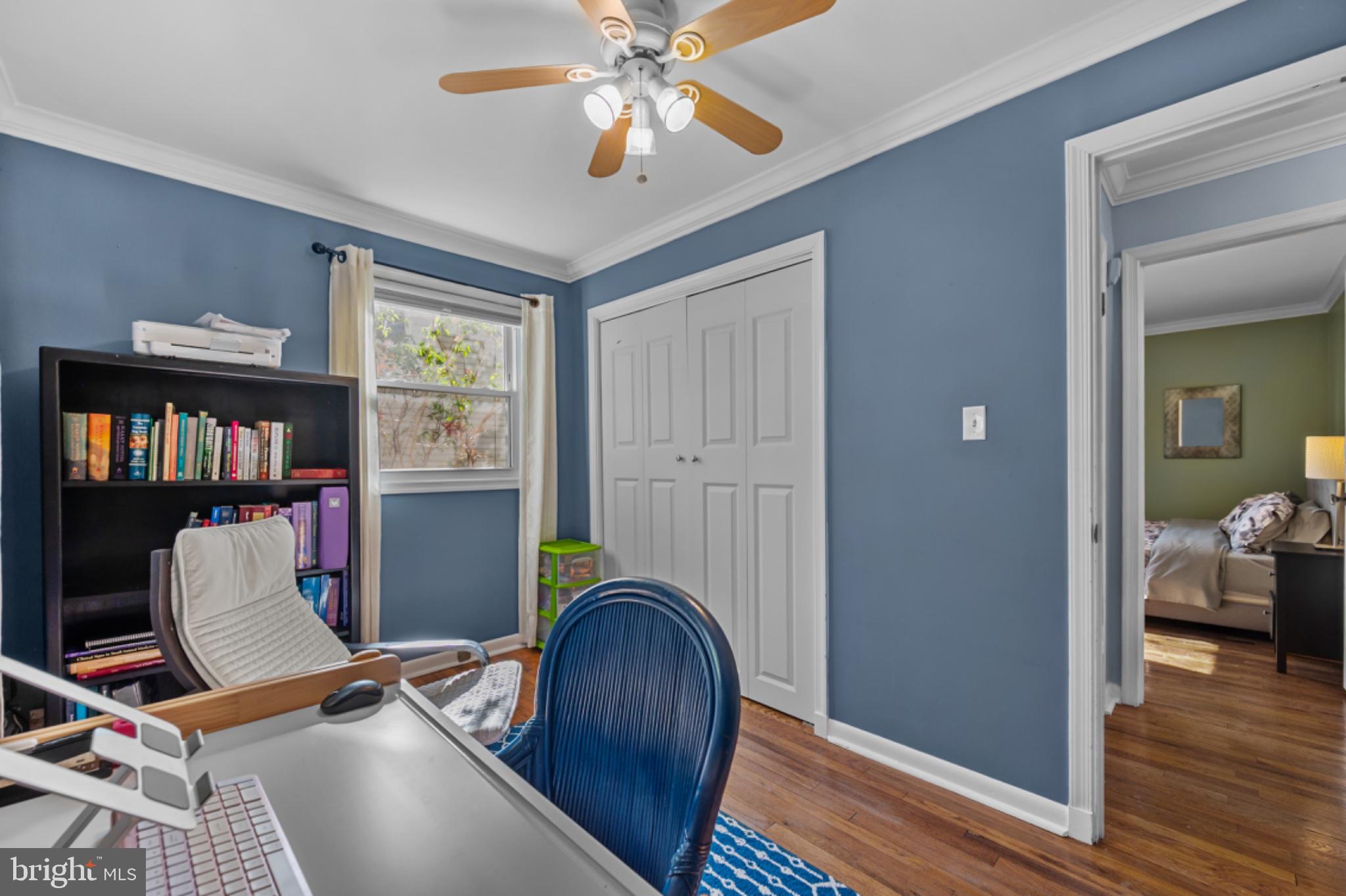 1001 Robin Road Silver Spring, MD 20901 - Photo 20 of 46 Cozy workspace with vibrant blue walls.
