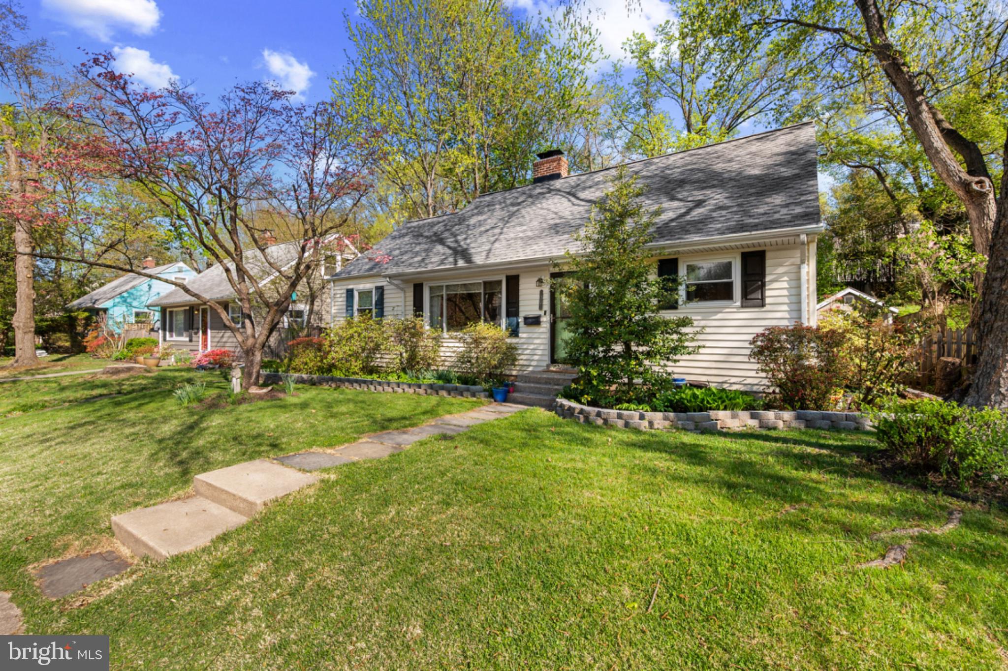 1001 Robin Road Silver Spring, MD 20901 - Photo 2 of 46 Charming home with lush greenery.