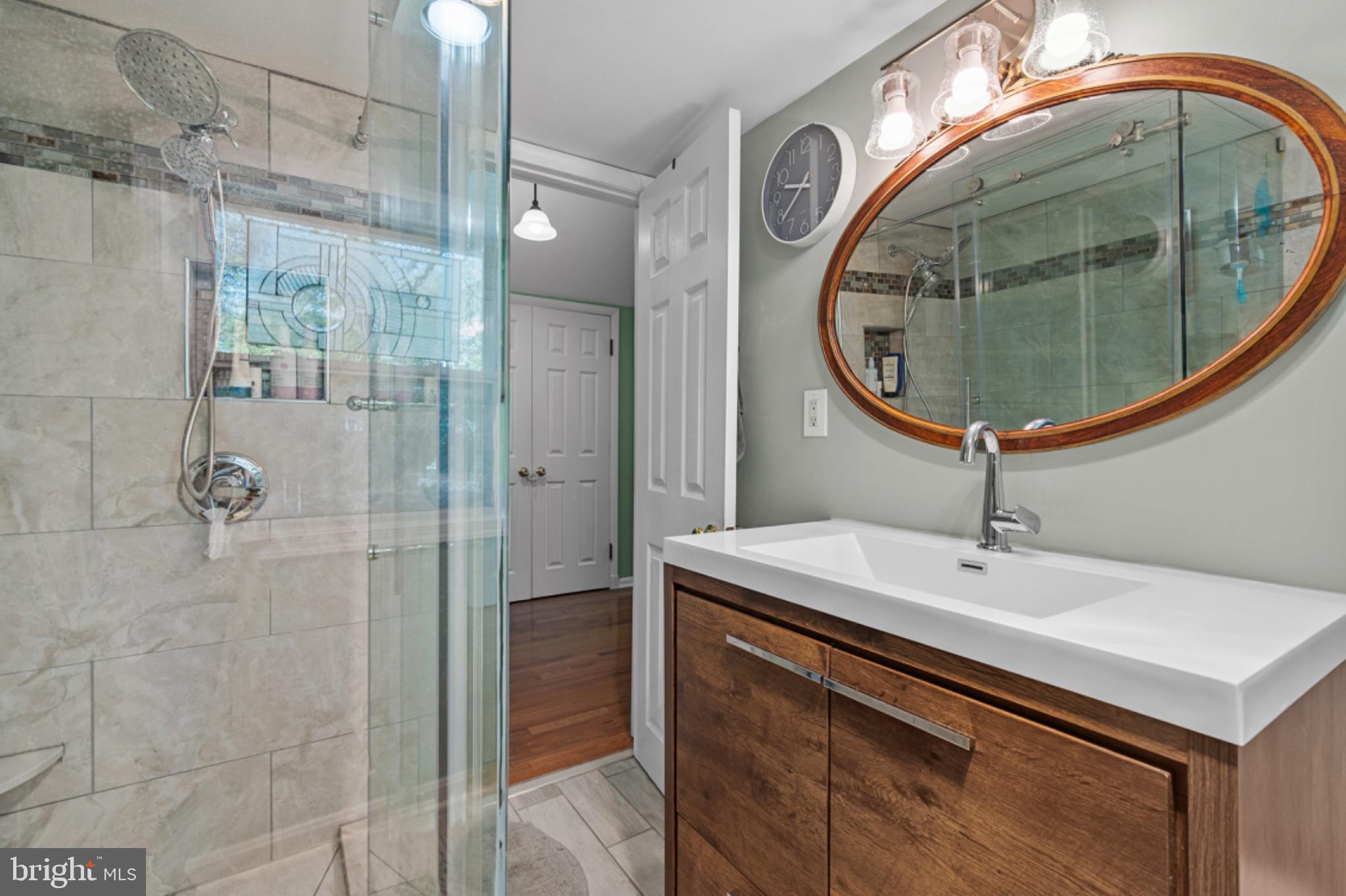 1001 Robin Road Silver Spring, MD 20901 - Photo 25 of 46 Modern bathroom with elegant finishes.