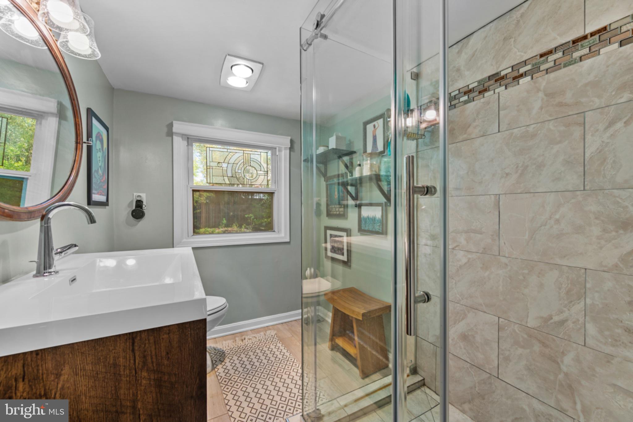 1001 Robin Road Silver Spring, MD 20901 - Photo 26 of 46 Modern bathroom with stylish finishes.