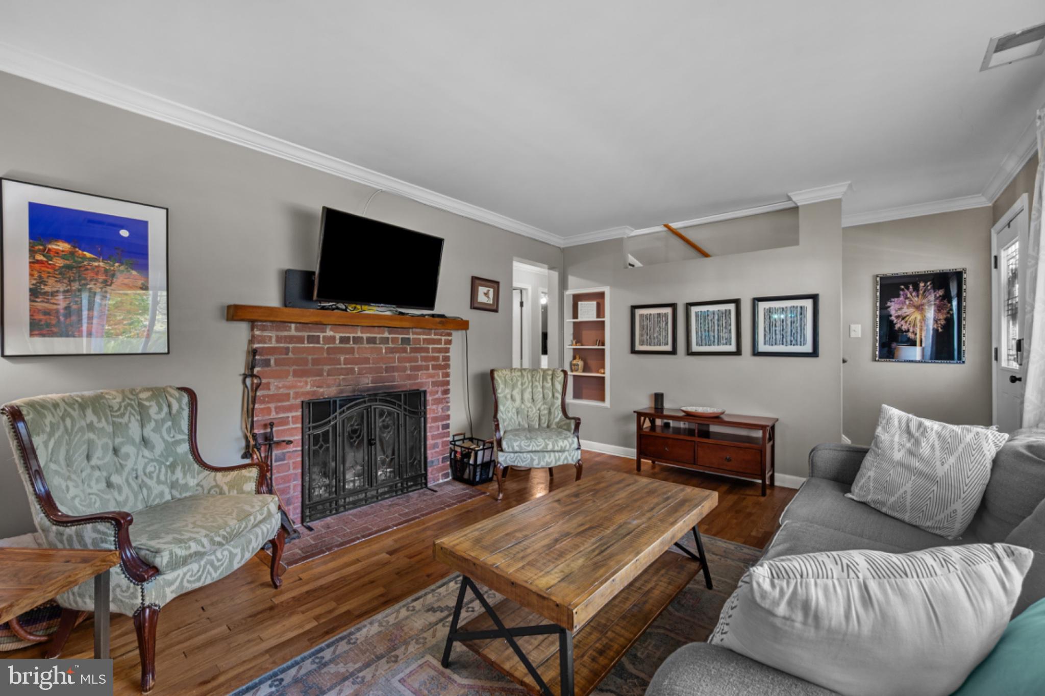 1001 Robin Road Silver Spring, MD 20901 - Photo 3 of 46 Cozy living room with classic charm.