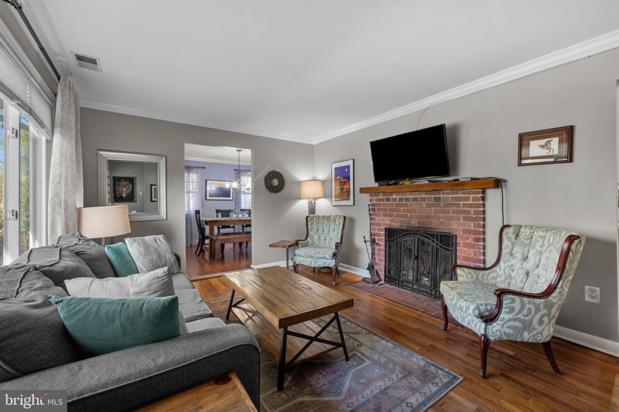 1001 Robin Road Silver Spring, MD 20901 - Photo 4 of 46 Cozy living space with warm accents.