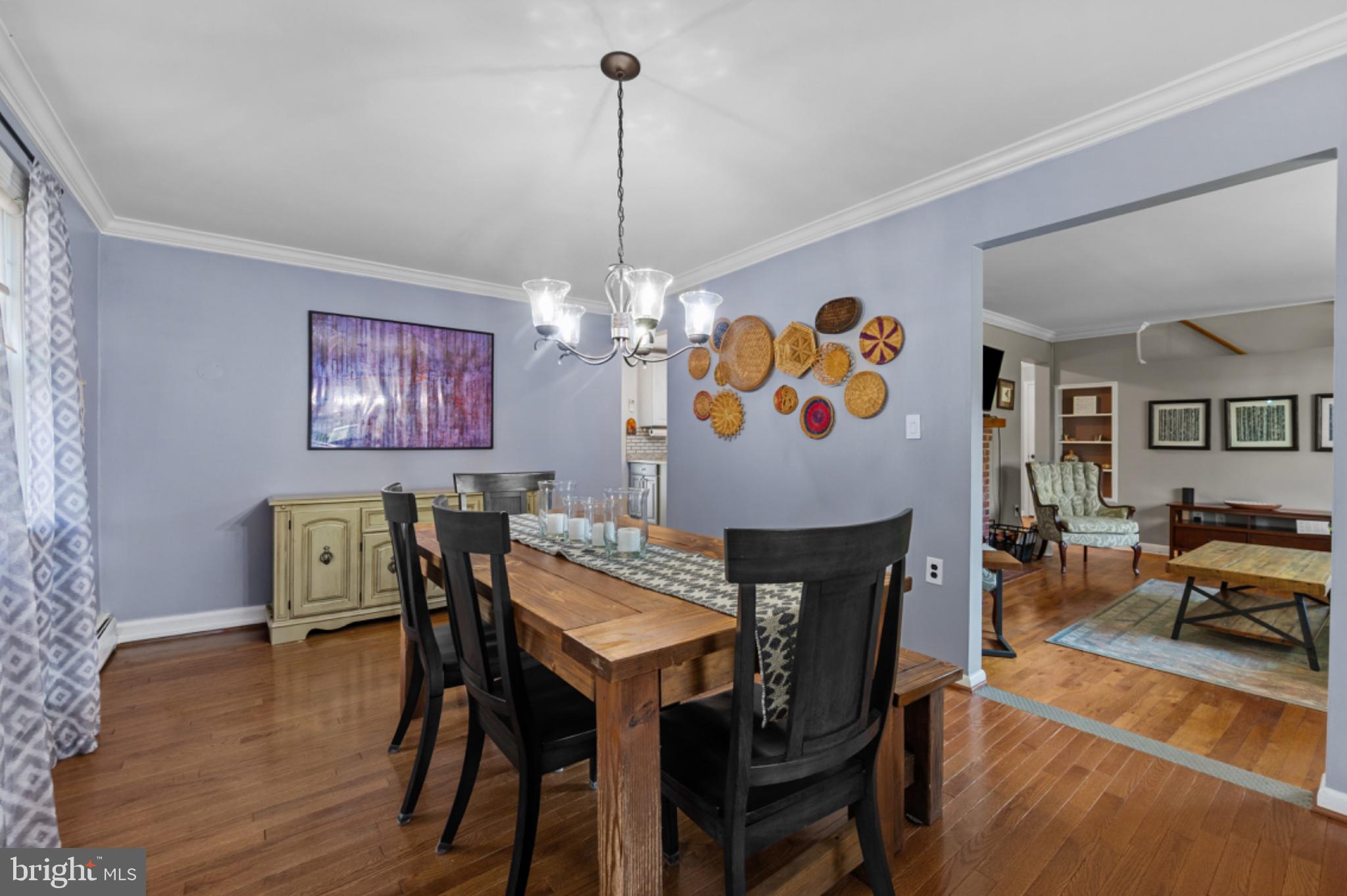 1001 Robin Road Silver Spring, MD 20901 - Photo 6 of 46 Charming dining space with artistic flair.