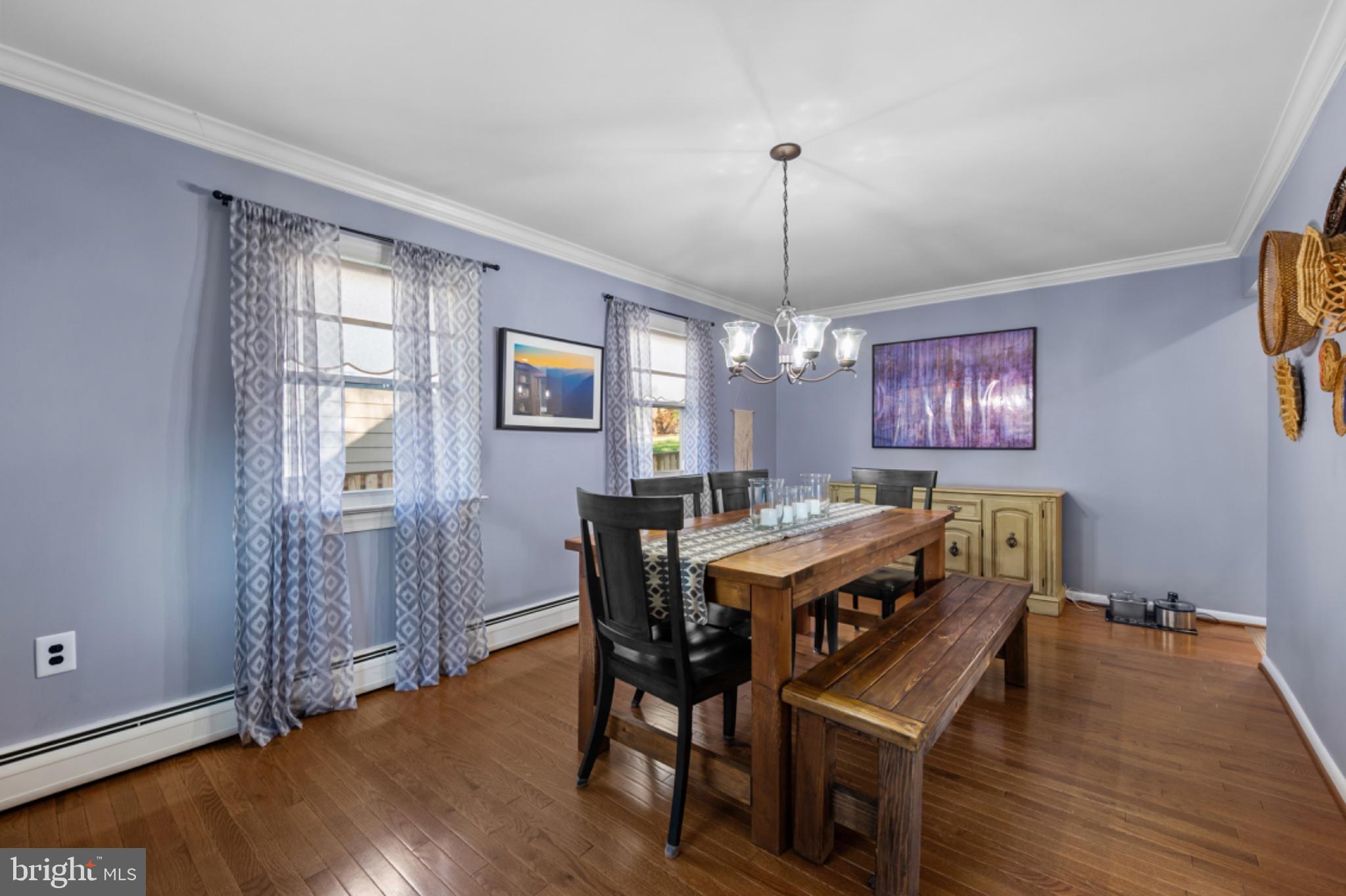 1001 Robin Road Silver Spring, MD 20901 - Photo 7 of 46 Charming dining space with serene hues.