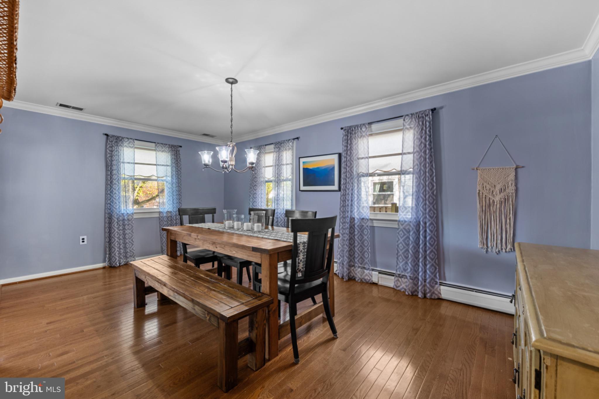 1001 Robin Road Silver Spring, MD 20901 - Photo 8 of 46 Charming dining space with serene hues.