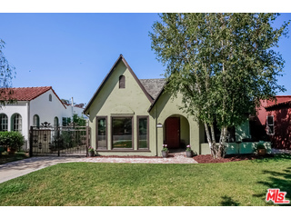 1555 Campus Road Los Angeles, CA 90042 - Photo 1 of 35 a front view of a house with a garden and plants