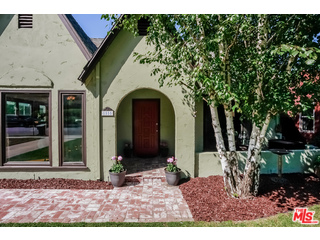 1555 Campus Road Los Angeles, CA 90042 - Photo 2 of 35 a front view of a house with garden