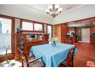 1555 Campus Road Los Angeles, CA 90042 - Photo 13 of 35 a view of a dining room with furniture window and wooden floor