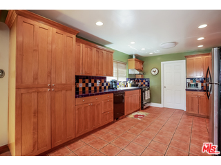 1555 Campus Road Los Angeles, CA 90042 - Photo 14 of 35 a kitchen with stainless steel appliances granite countertop a refrigerator and a sink