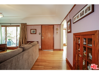 1555 Campus Road Los Angeles, CA 90042 - Photo 18 of 35 a living room with furniture and a large window