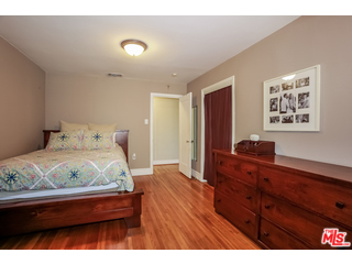 1555 Campus Road Los Angeles, CA 90042 - Photo 20 of 35 a bedroom with a bed and a dresser