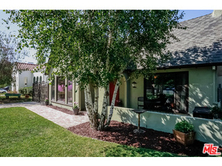 1555 Campus Road Los Angeles, CA 90042 - Photo 3 of 35 a view of a house with a tree in front of it