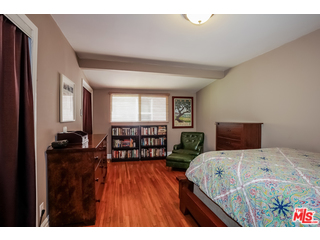 1555 Campus Road Los Angeles, CA 90042 - Photo 21 of 35 a bedroom with two beds and a large window