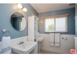 1555 Campus Road Los Angeles, CA 90042 - Photo 22 of 35 a bathroom with a sink and a mirror