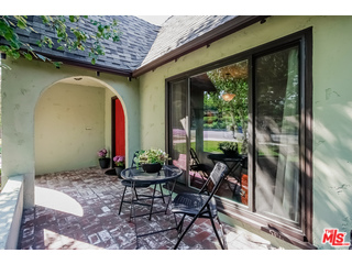 1555 Campus Road Los Angeles, CA 90042 - Photo 4 of 35 a backyard of a house with outdoor seating