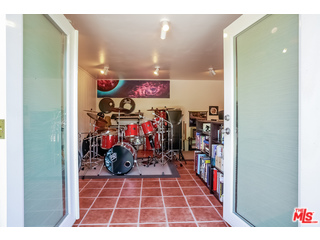 1555 Campus Road Los Angeles, CA 90042 - Photo 31 of 35 a view of a room with shelves