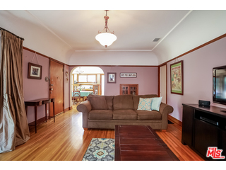 1555 Campus Road Los Angeles, CA 90042 - Photo 10 of 35 a living room with furniture and a wooden floor
