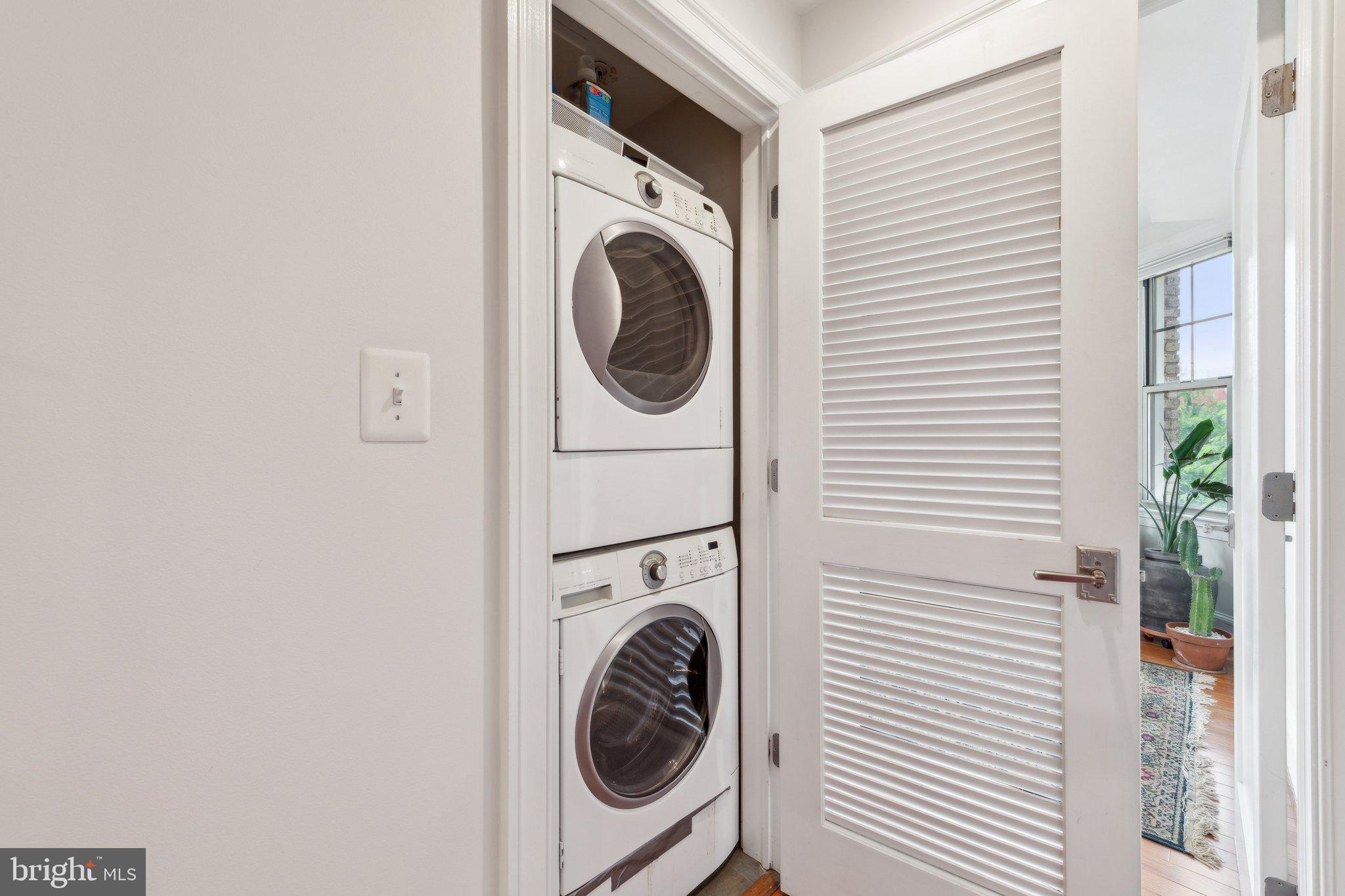 3220 17th Street Northwest, Unit 309 Washington, DC 20010 - Photo 19 of 25 a utility room with dryer and washer