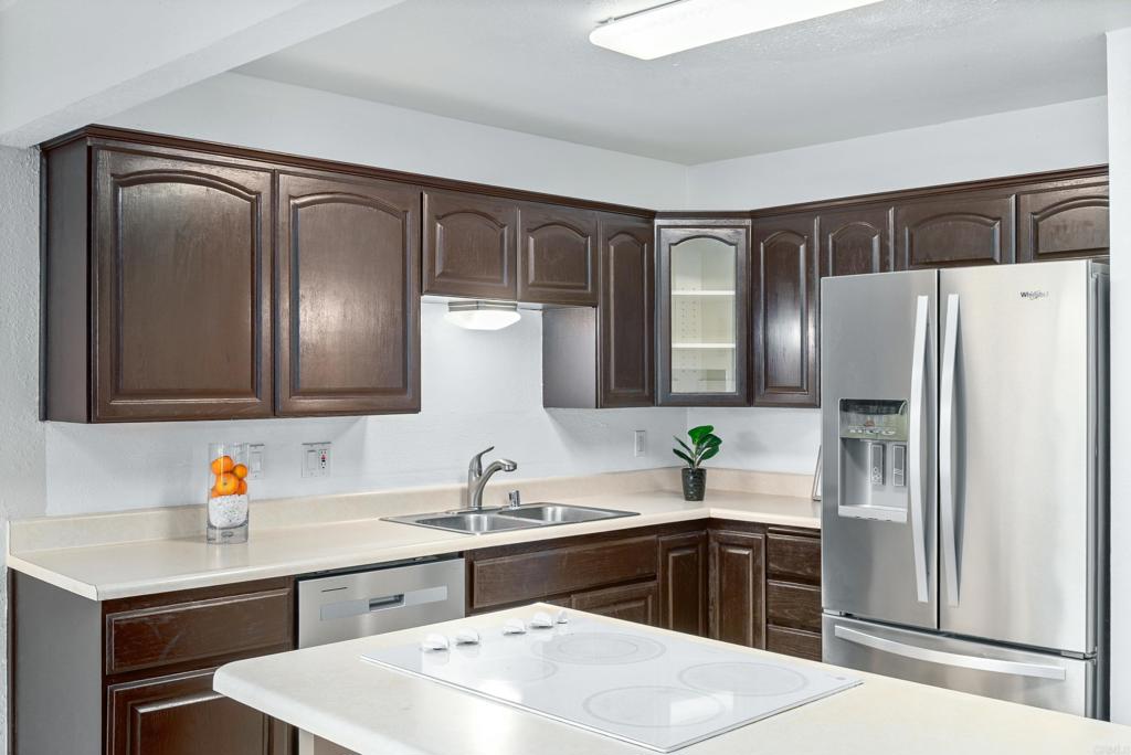 514 Shady Lane, Unit C El Cajon, CA 92021 - Photo 13 of 30 a kitchen with a refrigerator and a sink