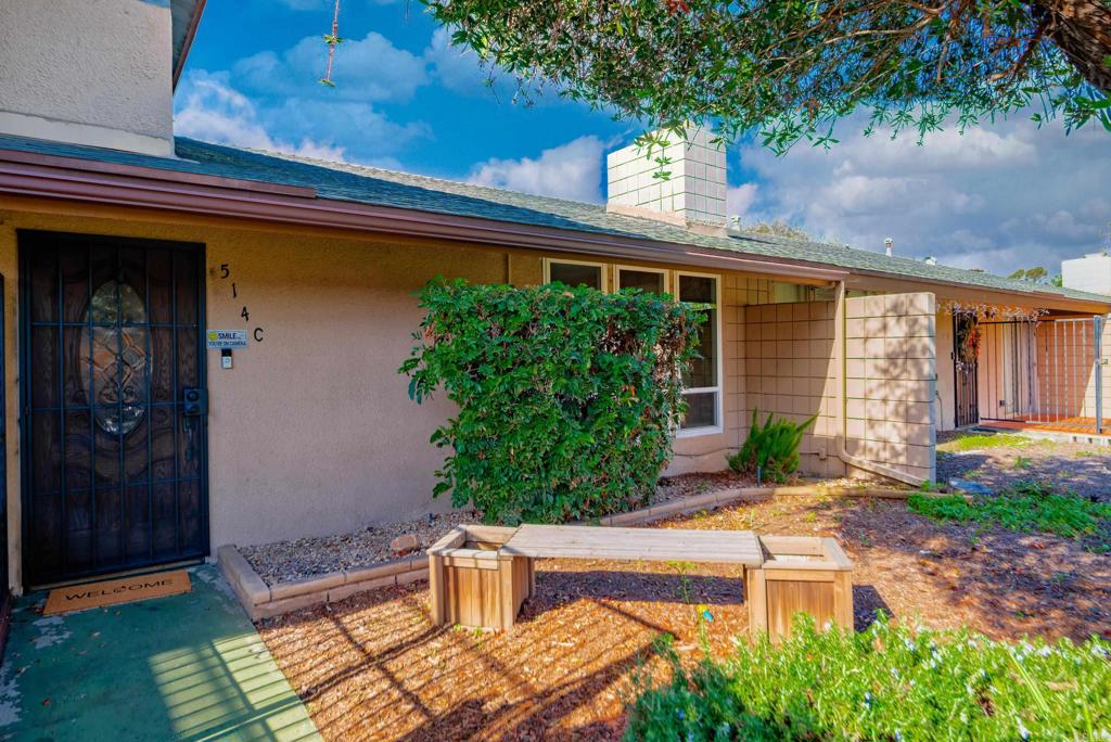 514 Shady Lane, Unit C El Cajon, CA 92021 - Photo 4 of 30 a front view of a house with garden
