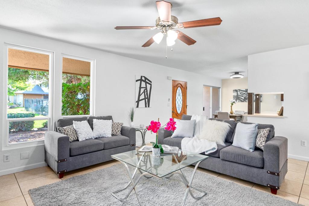 514 Shady Lane, Unit C El Cajon, CA 92021 - Photo 6 of 30 a living room with furniture and a large window