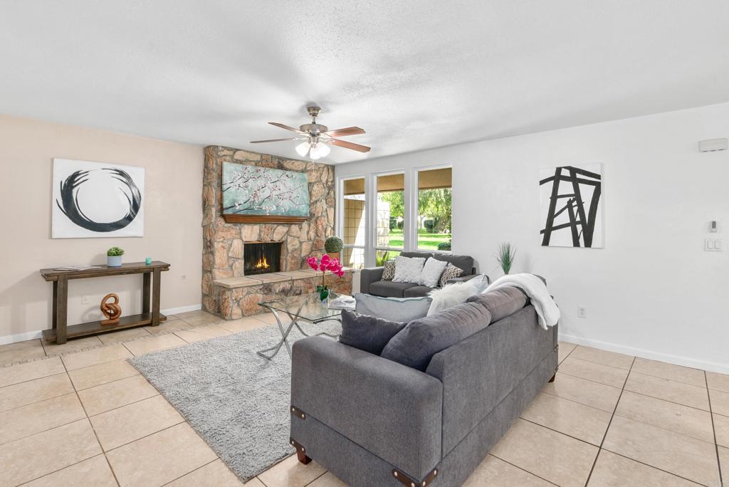 514 Shady Lane, Unit C El Cajon, CA 92021 - Photo 8 of 30 a living room with furniture and a fireplace