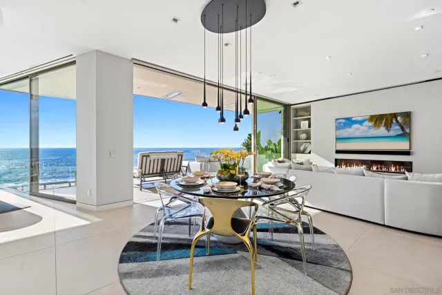 a kitchen with kitchen island granite countertop a sink appliances and cabinets
