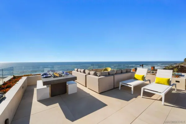 a view of a patio with swimming pool