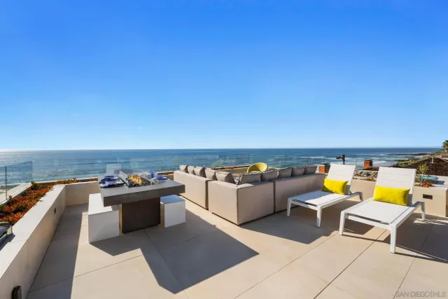 a view of a patio with swimming pool