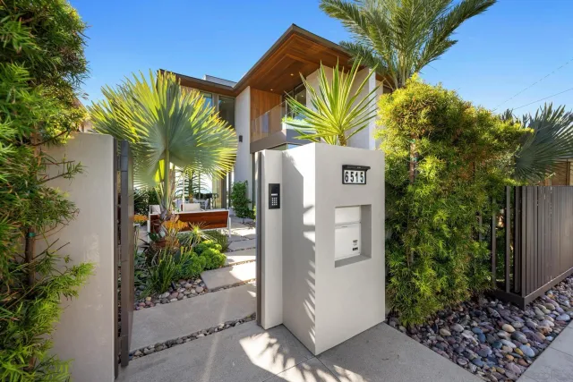 a view of a house with a garden