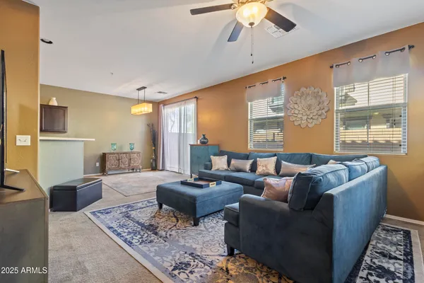 a view of livingroom with furniture and windows