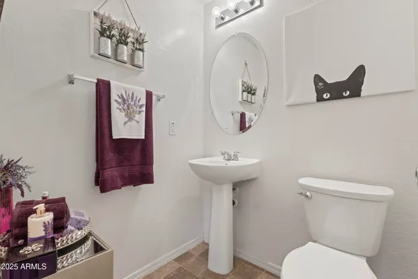 a view of entryway with wooden floor and stairs