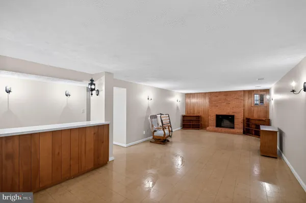 a view of a livingroom with a fireplace