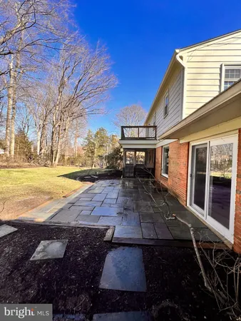a view of a yard with an outdoor space