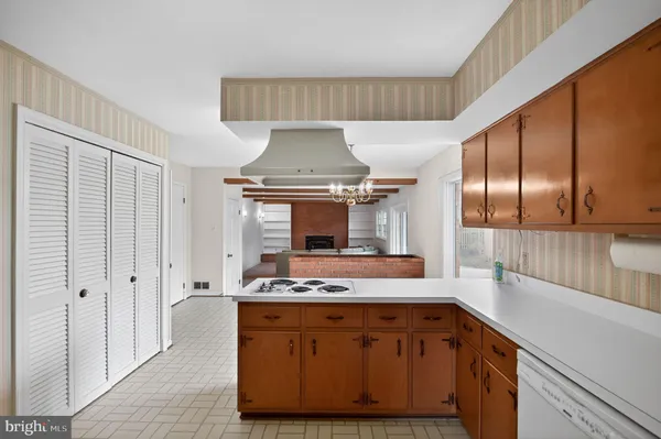 a bathroom with a sink and a large mirror