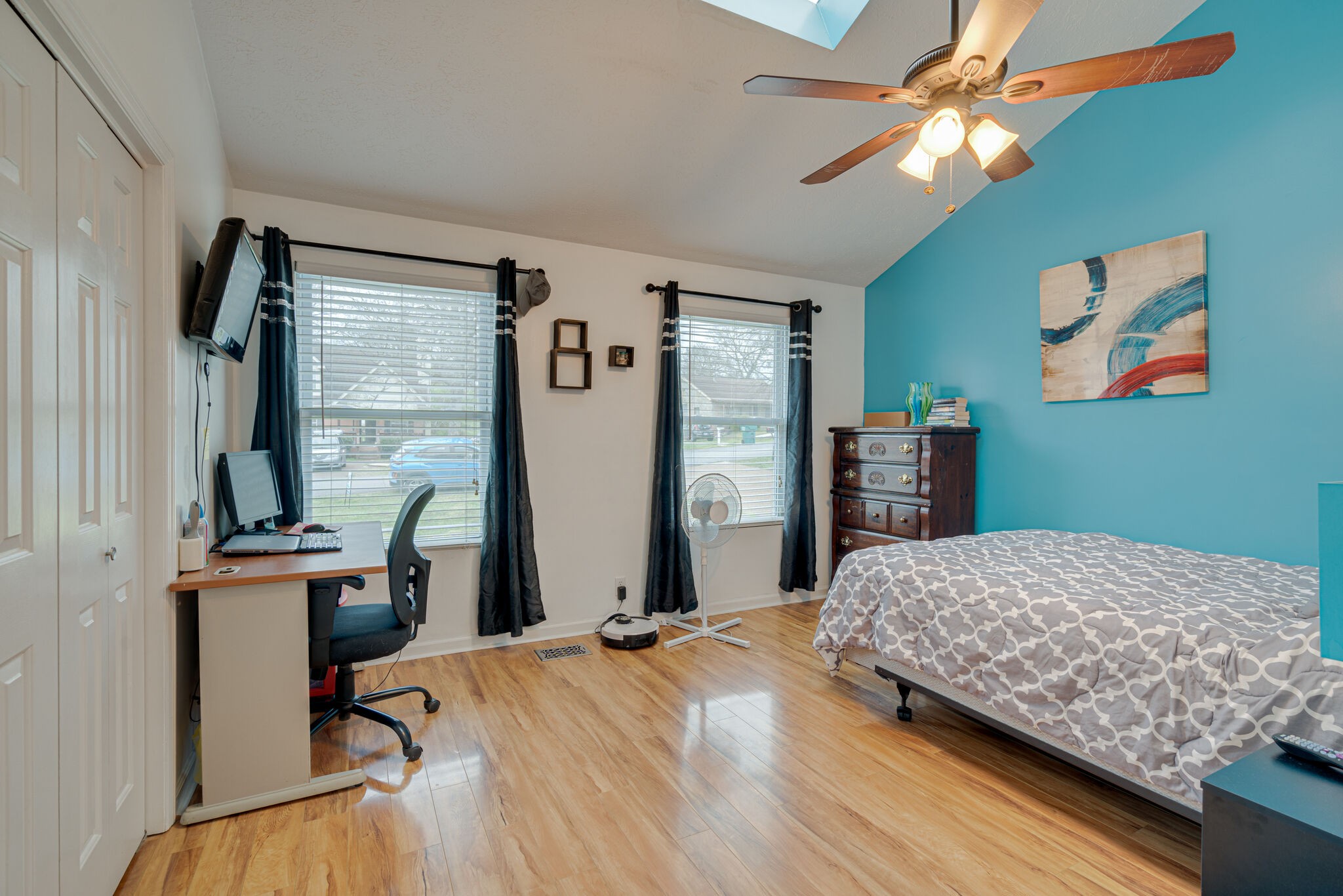 1453 Ocoee Trail Madison, TN 37115 - Photo 13 of 25 a bedroom with a bed dresser and a large window
