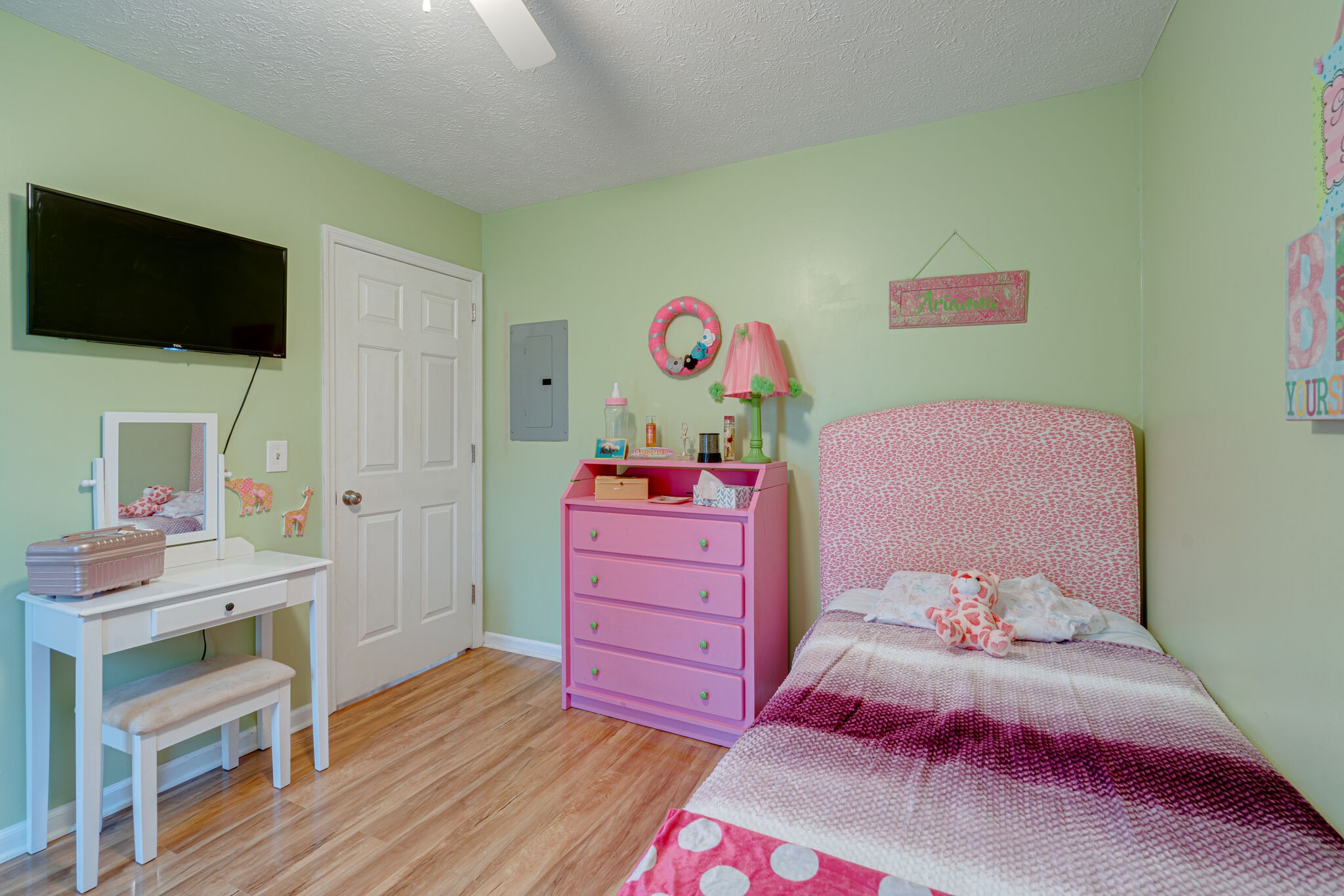 1453 Ocoee Trail Madison, TN 37115 - Photo 16 of 25 a bedroom with a bed and flat screen tv